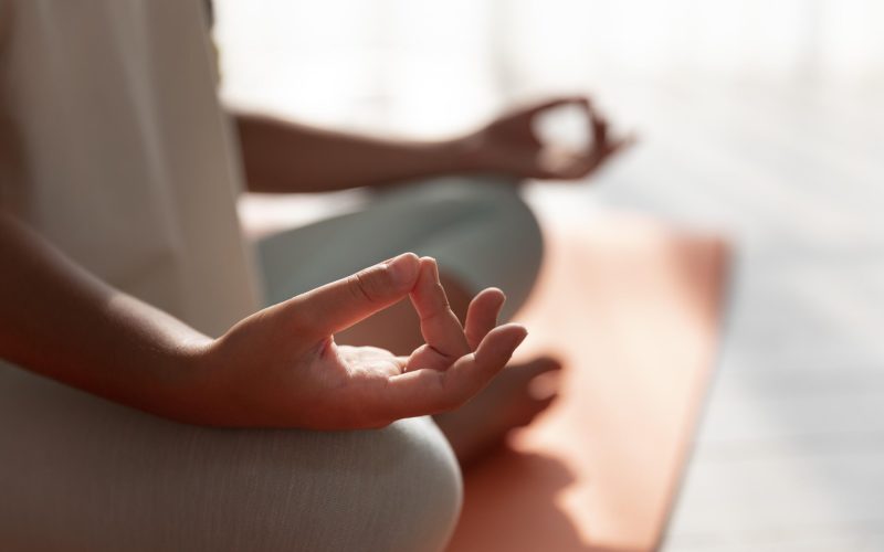 close-up-kid-meditating-mat